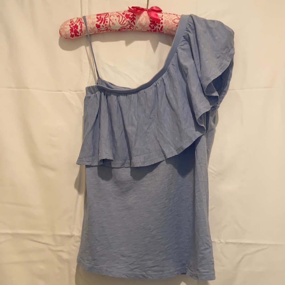 Light blue off-the-shoulder top.
